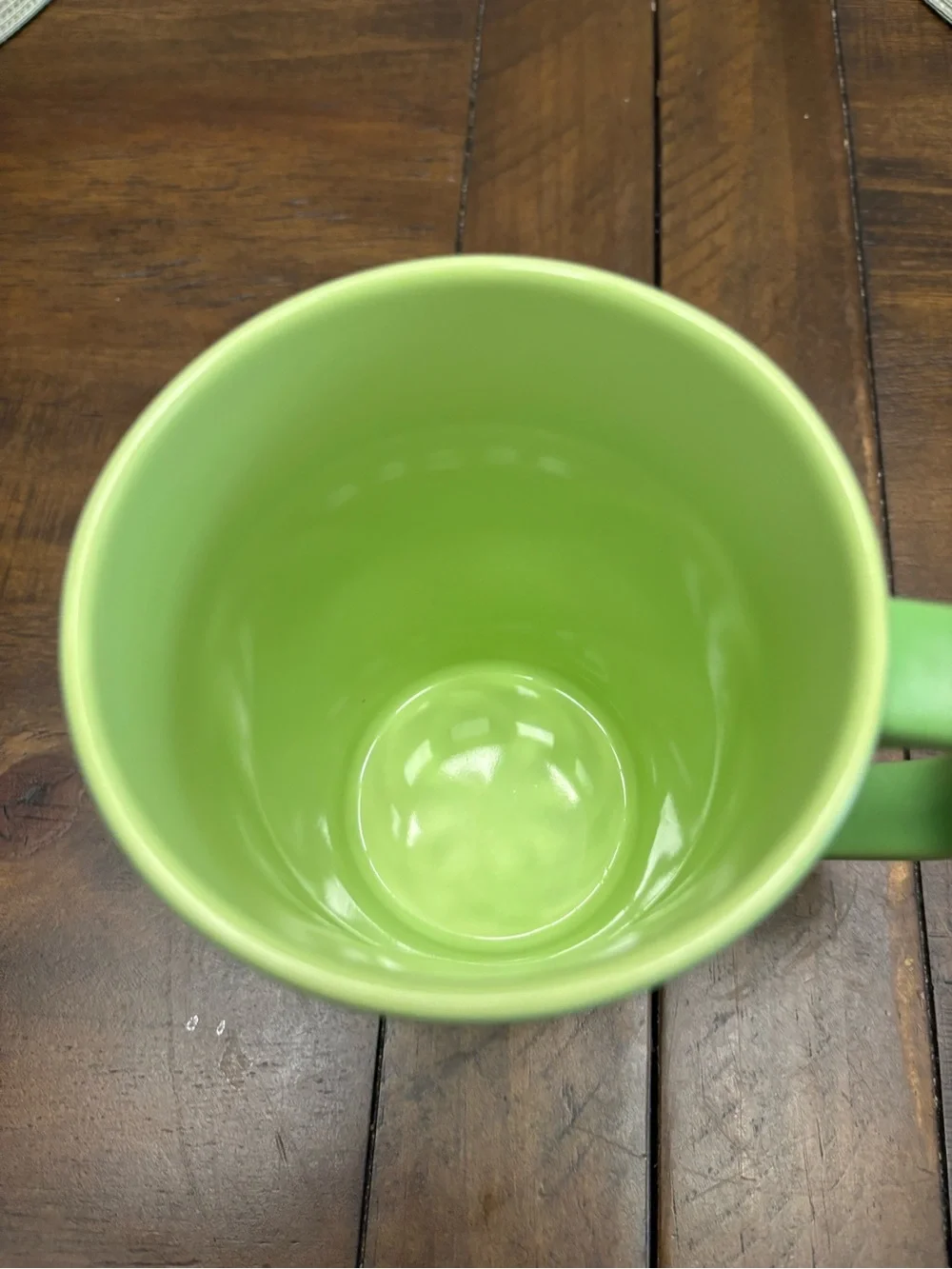 Large green ceramic Disney store dopey Snow White mug holds 18 ounces